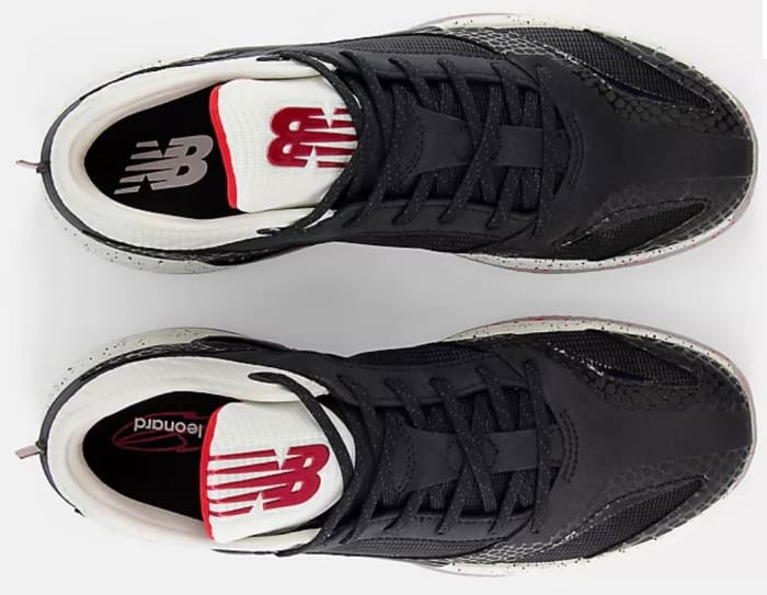 Top view of black and white New Balance shoes.